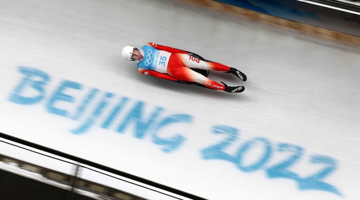 Mateusz Sochowicz of Poland competes in men’s luge at the Beijing Olympics.